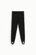 Image de Pantalon fuseau en maille dentelle à sous-pieds noir – Femme