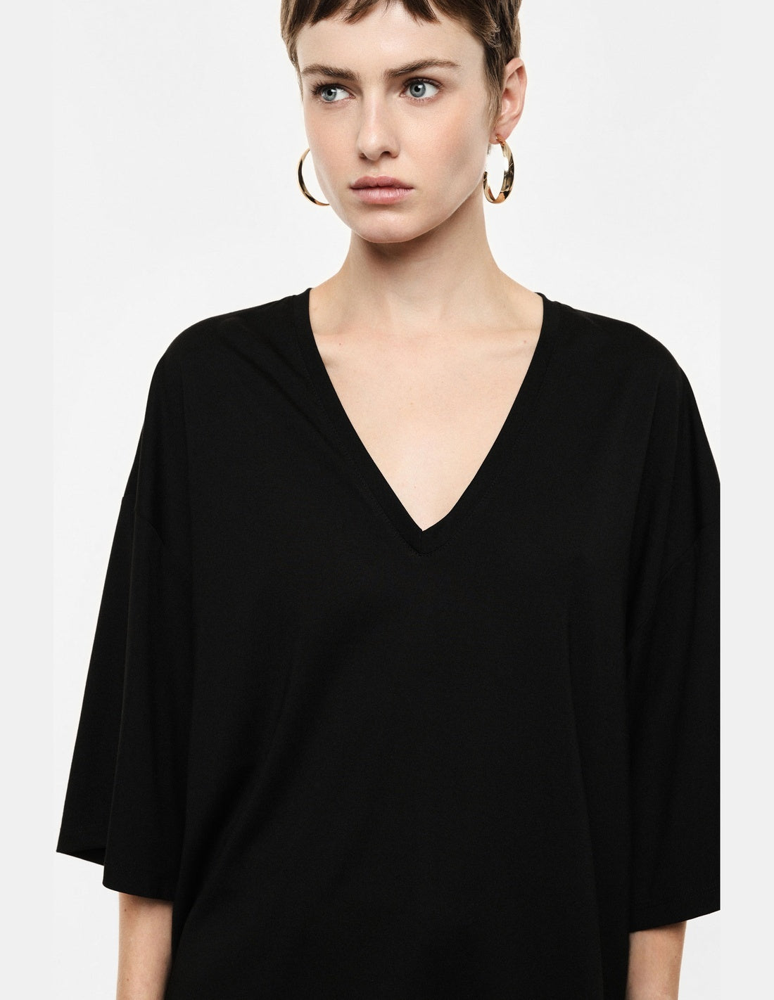 Top ample manches chauve-souris col V noir Imperial vue portée de profil